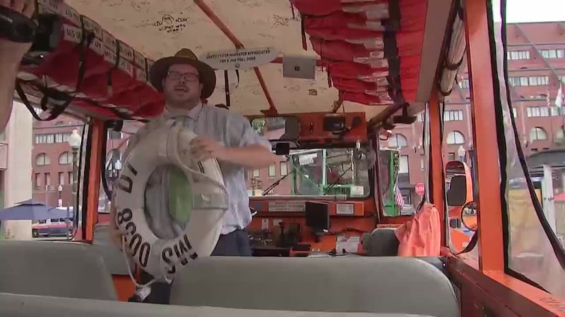 A duck boat crew saved a young child and the boy's father from a river in Massachusetts.