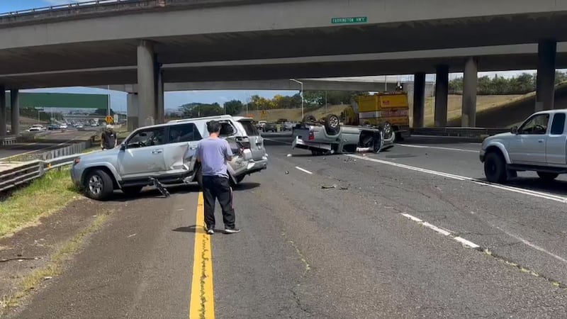 The overturned truck blocked multiple lanes Monday afternoon.