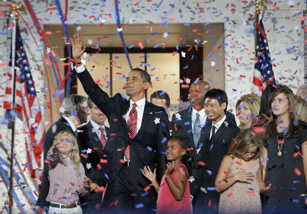 FILE - Democratic presidential candidate Sen. Barack Obama, D-Ill., waves with his family and...