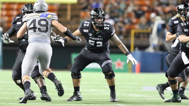 Junior offensive lineman Solo Vaipulu plays in a game against Air Force during the 2019...