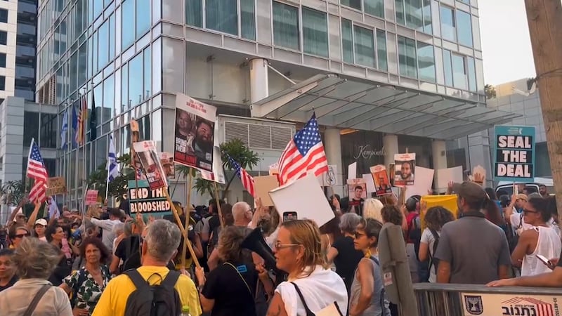 Protesters calling for a hostage deal gathered Monday, August 19, 2024, outside of the...