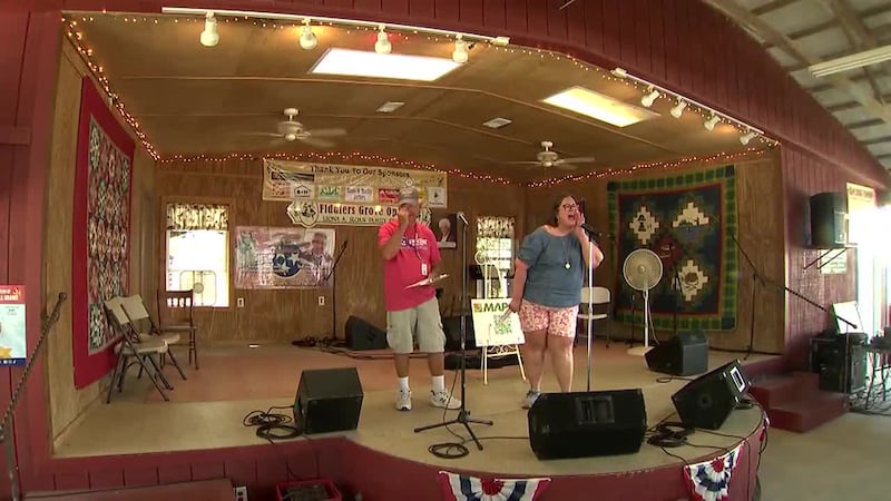 There's no ignoring these calls; wives summon their husbands in state fair competition.