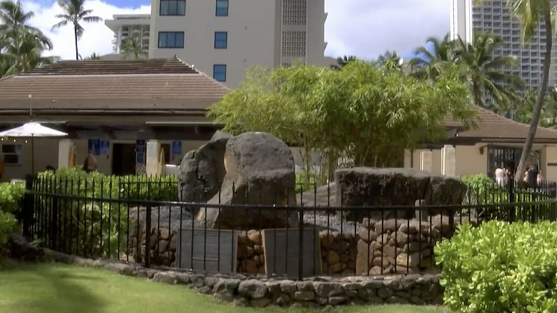 The four Kapaemahu Stones sit in Waikiki next to the police substation.